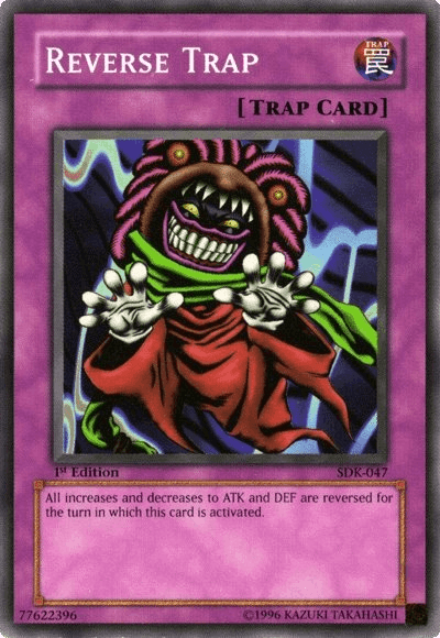 The image is of a Yu-Gi-Oh! trading card from the Starter Deck: Kaiba titled "Reverse Trap [SDK-047] Common," a Normal Trap Card. The artwork features a menacing figure with a wide grin, sharp teeth, and colorful spiked hair. The figure wears a red cloak and gloves, with hands raised. Card text describes reversing ATK and DEF increases/decreases.