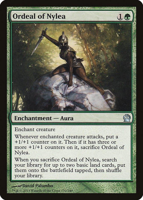 An Ordeal of Nylea [Theros] Magic: The Gathering card from the Theros set. It is an Enchantment—Aura that requires 1 generic mana and 1 green mana to cast. The artwork depicts a warrior with an animalistic helmet and a spear standing atop a rock. The card's abilities involve adding +1/+1 counters and searching for basic land cards.