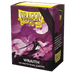 The image shows a box of Dragon Shield: Standard 100ct Sleeves - Wraith (Dual Matte) by Arcane Tinmen. The box features vibrant artwork of a menacing, purple wraith in a dynamic pose against a smoky, ethereal background. Text on the box provides product details and specifications for TCGs enthusiasts.