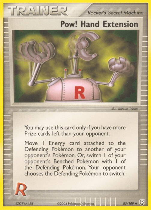 The image depicts an uncommon Pokémon trading card titled "Pow! Hand Extension (85/109) [EX: Team Rocket Returns]," part of the Team Rocket Returns set. It features an illustration of a robotic hand with claws extending on a mechanical arm. The card belongs to the Rocket's Secret Machine category and has text detailing its specific in-game effect.